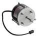 A round, small metal Heatcraft evaporator fan motor with a black wire.