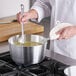 a close up of a pot on a stove