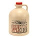 A large jug of Mountain Cider Company 100% Natural Spiced Apple Cider Concentrate with a red lid and a handle.