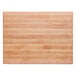 A close up of a John Boos maple wood cutting board with hand grips.