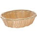 A Tablecraft oval polypropylene bread basket with a steel handle.