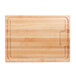 A John Boos maple wood cutting board with hand grips.