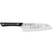 A Kai PRO Santoku Knife with a black and white POM handle.