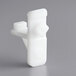 A white plastic Galaxy shelf clip.