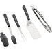 A group of Wusthof barbecue tools with black handles, including tongs and a spatula.