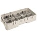 A beige plastic Cambro rack with 10 compartments and 2 extenders with holes.