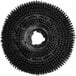 A circular black Lavex floor scrubbing brush with black bristles.