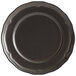 An Acopa Condesa Armor Gray porcelain plate with a scalloped rim.