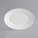 a white plate with a fork