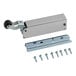A polished chrome metal Kason SureClose door closer body with screws and holes.
