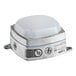 A close up of a Kason surface mount LED light fixture with a small white light.