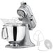 a mixer with a bowl and a attachment