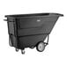 A black standard-duty tilt truck or trash cart with a 1 cubic yard capacity and wheels for easy transport.