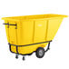 A yellow container on black wheels.