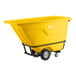 A yellow heavy-duty tilt truck or trash cart with a 0.5 cubic yard capacity and wheels for easy transport.