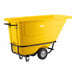 A yellow heavy-duty tilt truck or trash cart with a 0.5 cubic yard capacity and wheels for easy transport.