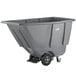 A grey plastic container on wheels.