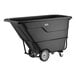 A black heavy-duty tilt truck or trash cart with a 1 cubic yard capacity and sturdy wheels.