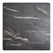 A square table top with a smooth, dark stone-like Letizia finish and white veining.