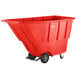 A red plastic container with wheels.