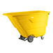 A yellow light-duty tilt truck or trash cart with a 1 cubic yard capacity and wheels for easy transport.