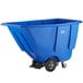 A blue plastic container on wheels.