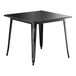 A Lancaster Table & Seating black square table with metal legs.