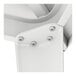 A close-up of a metal corner bracket on a white Lancaster Table & Seating outdoor table.