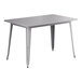 A grey rectangular Lancaster Table & Seating Alloy Series outdoor table with metal legs.