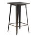 A Lancaster Table & Seating distressed copper bar table with a square top.