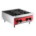 An Avantco red and black 4 burner gas countertop range.