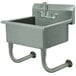 A stainless steel Advance Tabco wall mounted hand sink with a faucet.