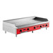 An Avantco countertop gas griddle with a red handle.