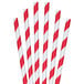 A group of Aardvark red and white striped paper straws.