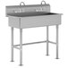 A stainless steel Advance Tabco multi-station hand sink with two faucets.