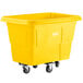 A yellow plastic container on wheels.