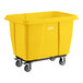 A yellow Lavex 8 cubic foot cube truck with a 500 lb. capacity and four caster wheels.