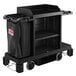 A Suncast black housekeeping cart with black bags on it.