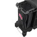 A black Suncast bag on a black cart.