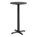 A round bar height table with a smooth black finish and a cross base plate.