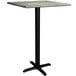 A Lancaster Table & Seating square bar height table with a black base and a textured canyon metal top.