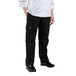 A woman chef wearing black cargo pants.