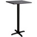 A black square Lancaster Table & Seating bar height table with a black metal cross base.