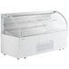 An Avantco white horizontal air curtain merchandiser with clear glass doors.