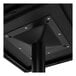 A close-up view of the underside of a square table with a black cross base plate and a textured faux metal finish.
