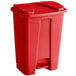 A red Lavex rectangular step-on trash can with lid.