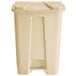 A beige plastic Lavex rectangular step-on trash can with a lid.