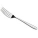 An Acopa Remy stainless steel fork with a silver handle.