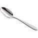 An Acopa Remy stainless steel serving spoon with a silver handle.