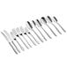 Acopa Remy 18/8 stainless steel flatware set with spoons and forks.